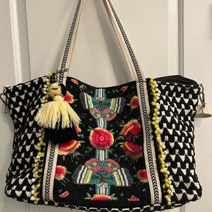 America and beyond brand bead, embellished tote bag with clutch.